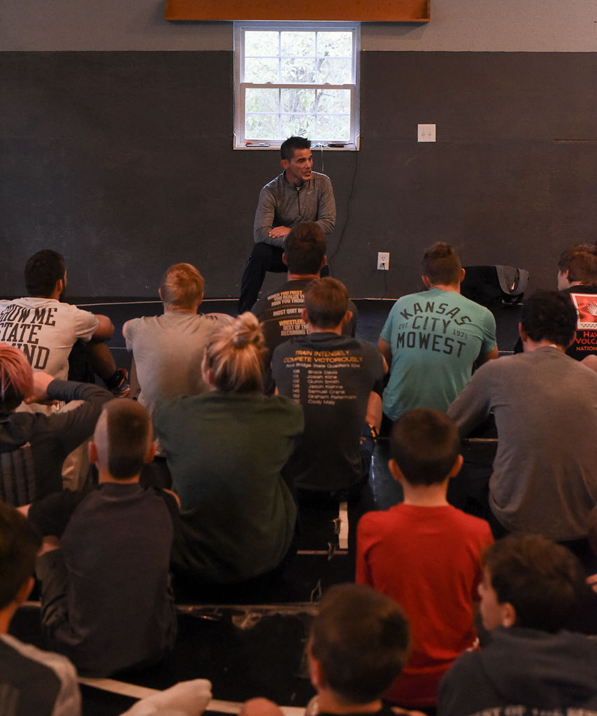 Mike Eierman talks to his wrestlers